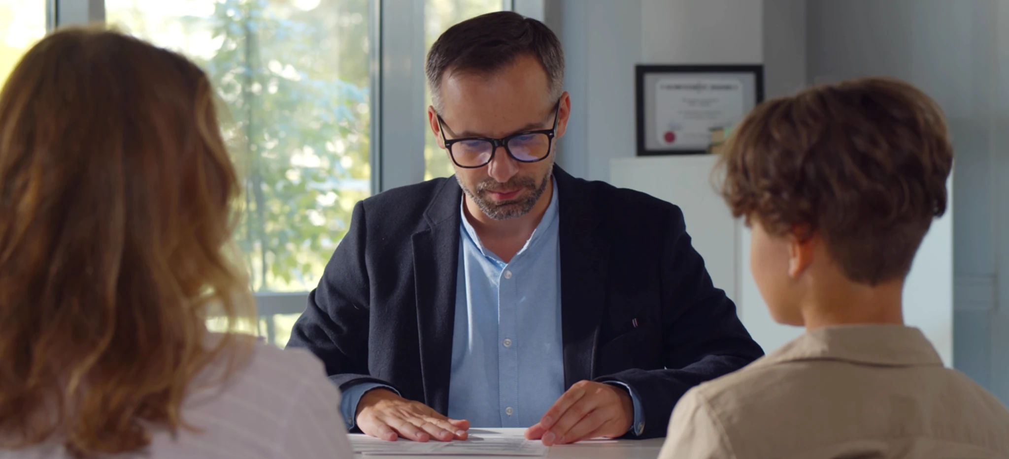 Family discussing Swiss boarding school visits with education advisor