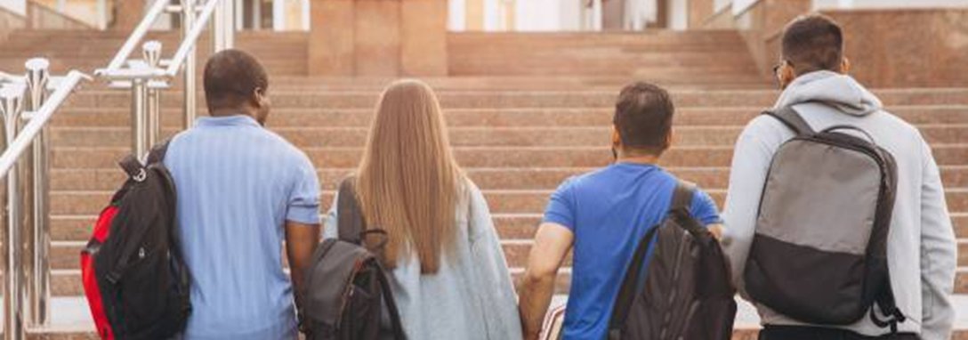 Swiss boarding school students walking toward university campus international education pathways
