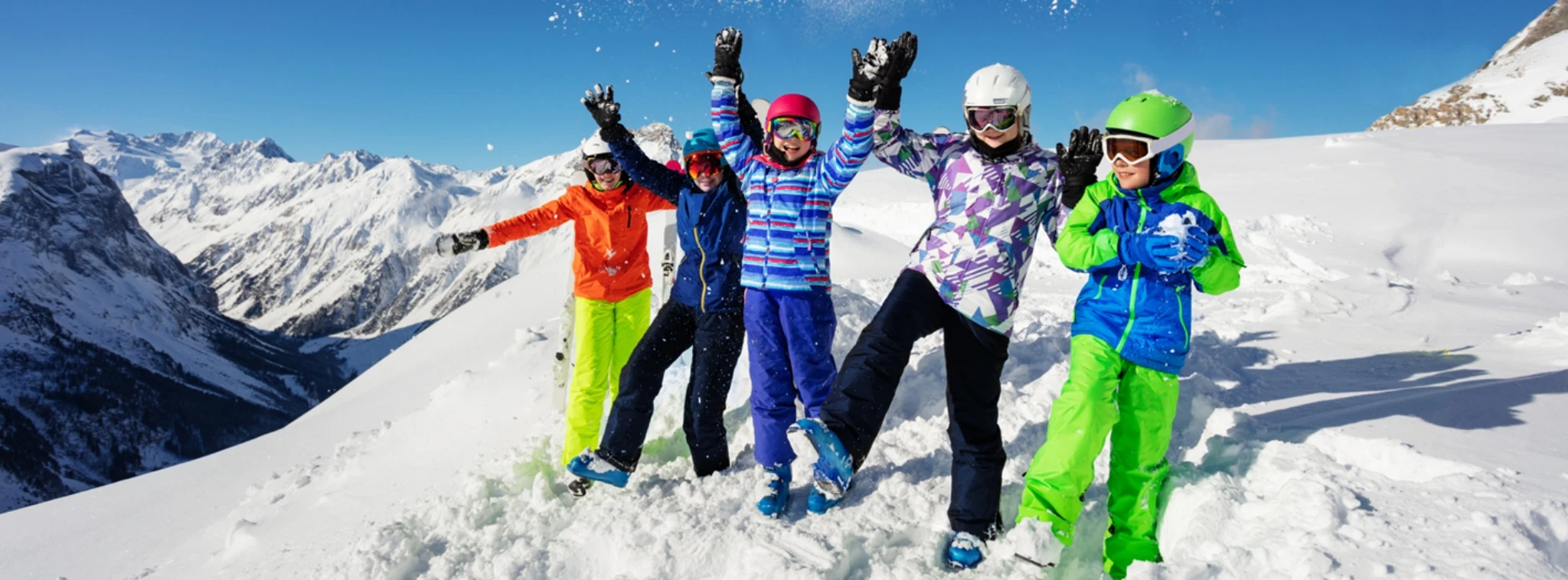 Students enjoying a Swiss winter camp in the Alps with skiing and outdoor activities