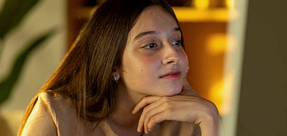 Student thoughtful expression reflecting personality and learning profile